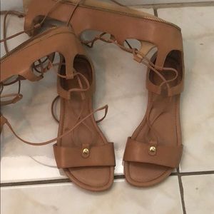 Michael Kors gladiator sandals.